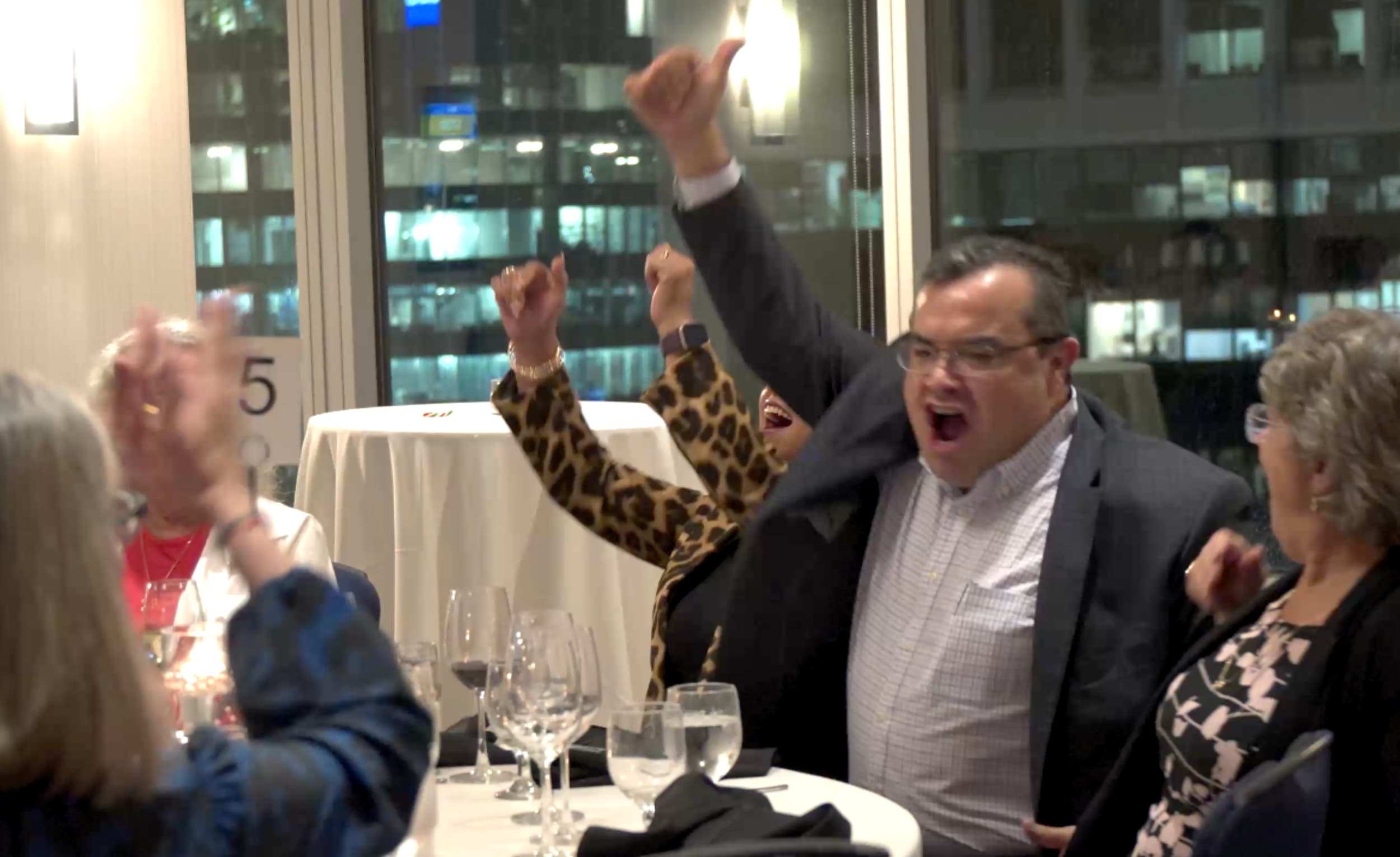 A crowd cheering during a hosted event in Vancouver
